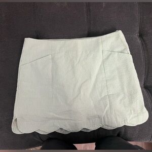 Green seersucker striped women’s skirt with belt and shorts